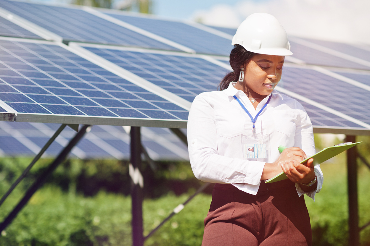 Female engineer solar panels